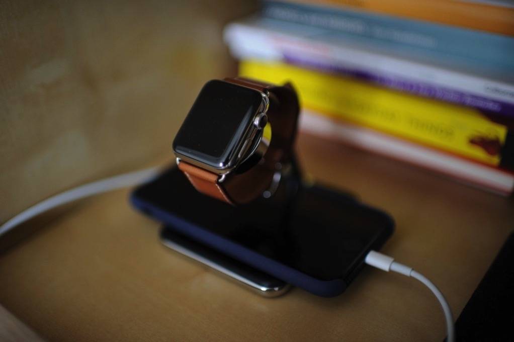 My Apple Watch and iPhone 7 on my bedside stand