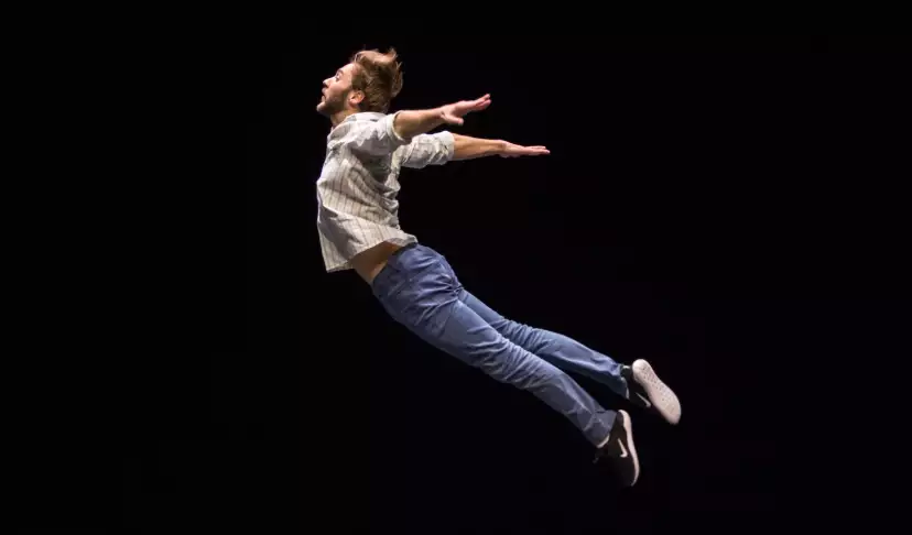 Dancer in full jump. Photo by Gregory Batardon.