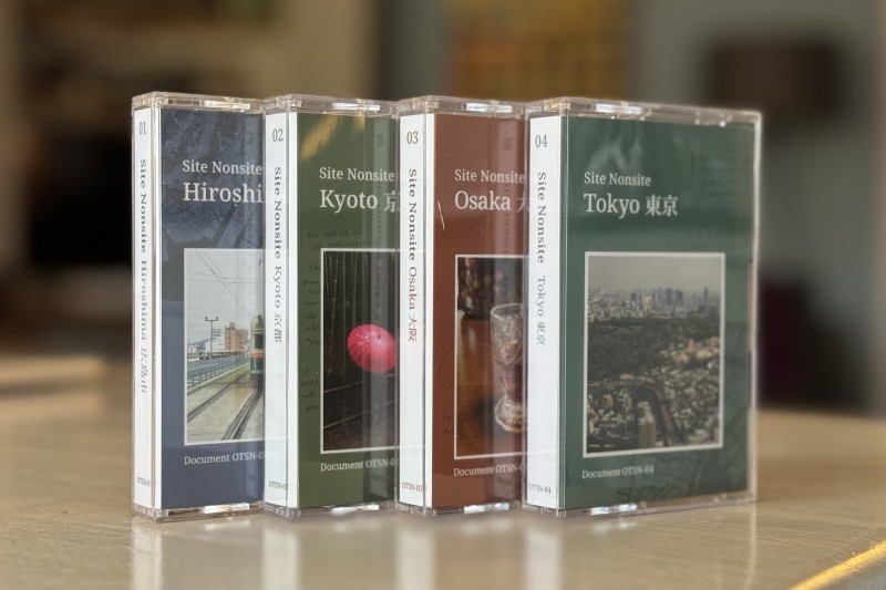 The 4 cassettes lined up on my kitchen table in their white cover