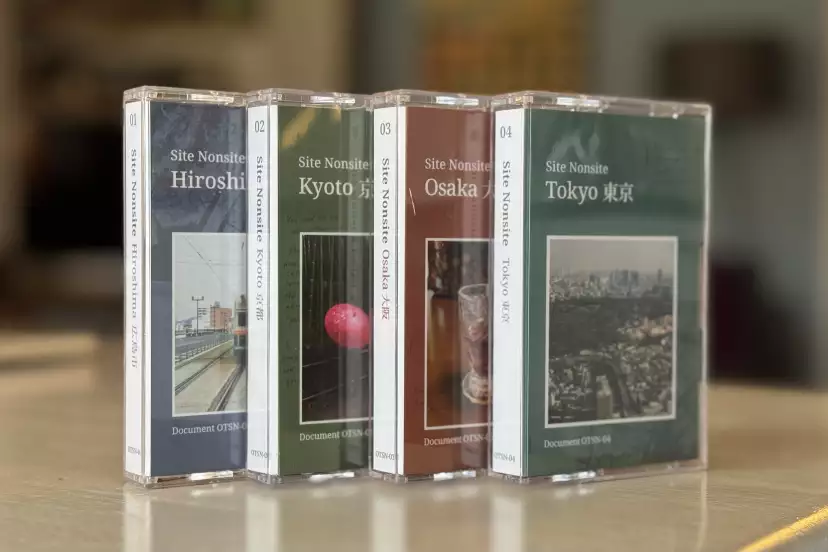 The 4 cassettes lined up on my kitchen table in their white cover