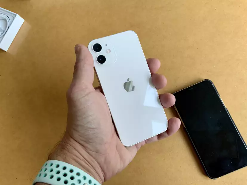 iPhone 12 mini in hand