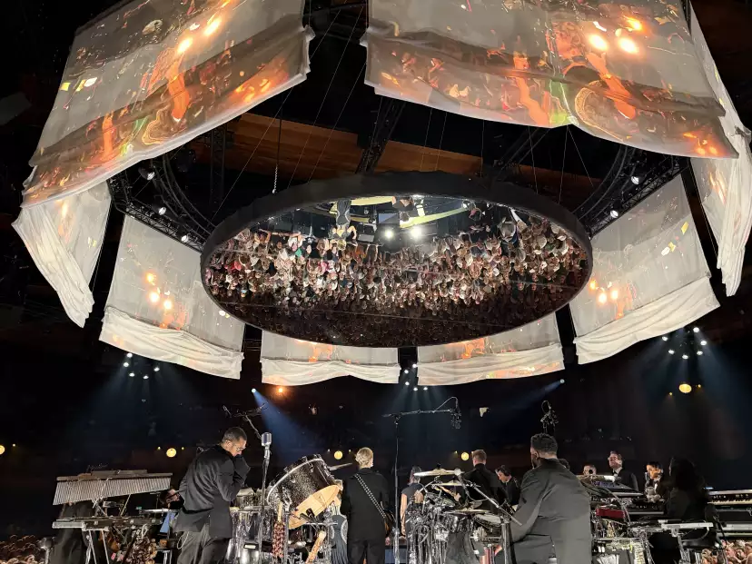Rear view of the set, with a down looking mirror reflecting the set and the crowd