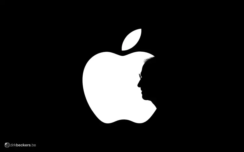 White Apple logo on black background with Steve Jobs profile cutting out the apple