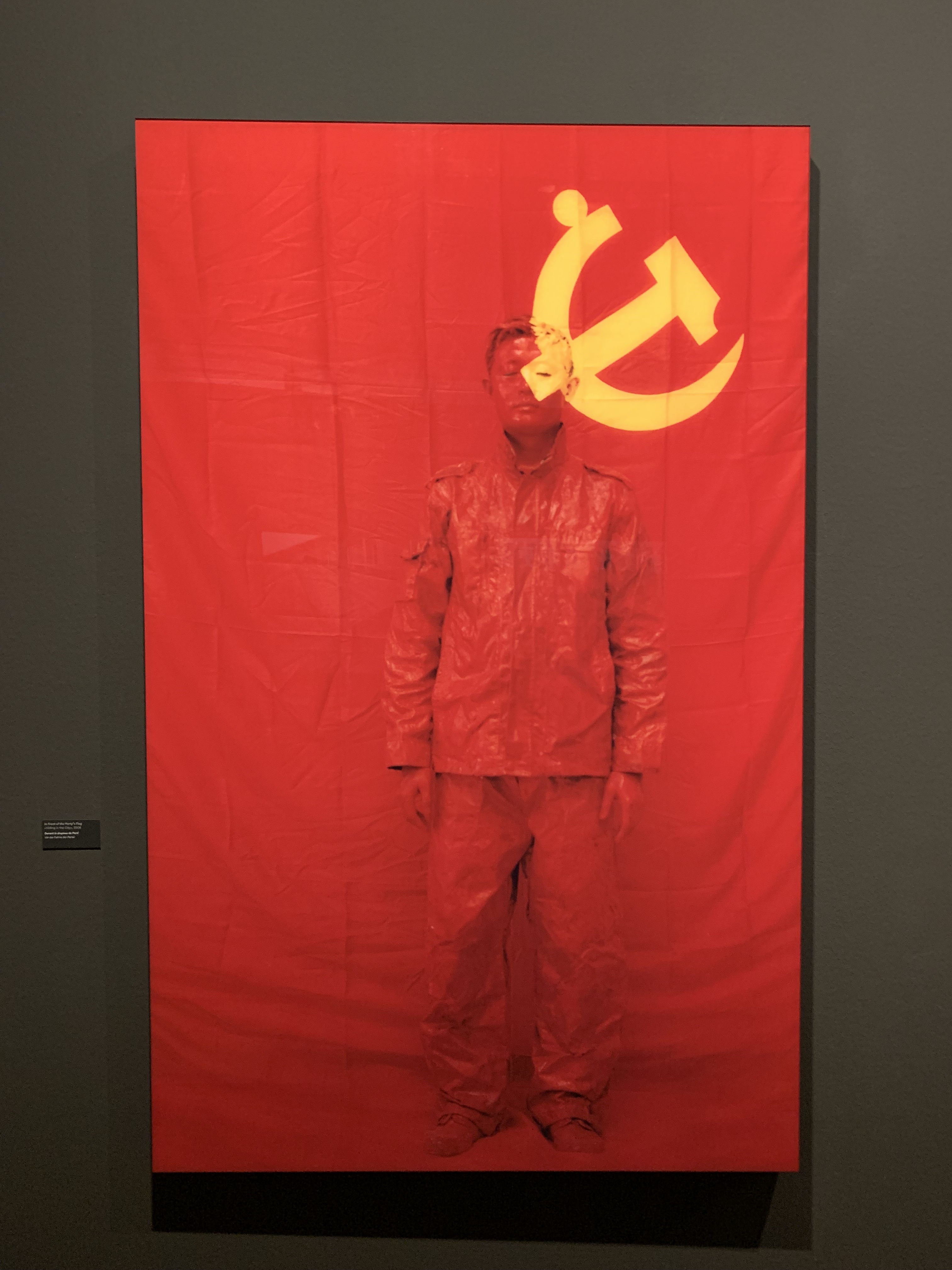 Liu Bolin painted in China's flag