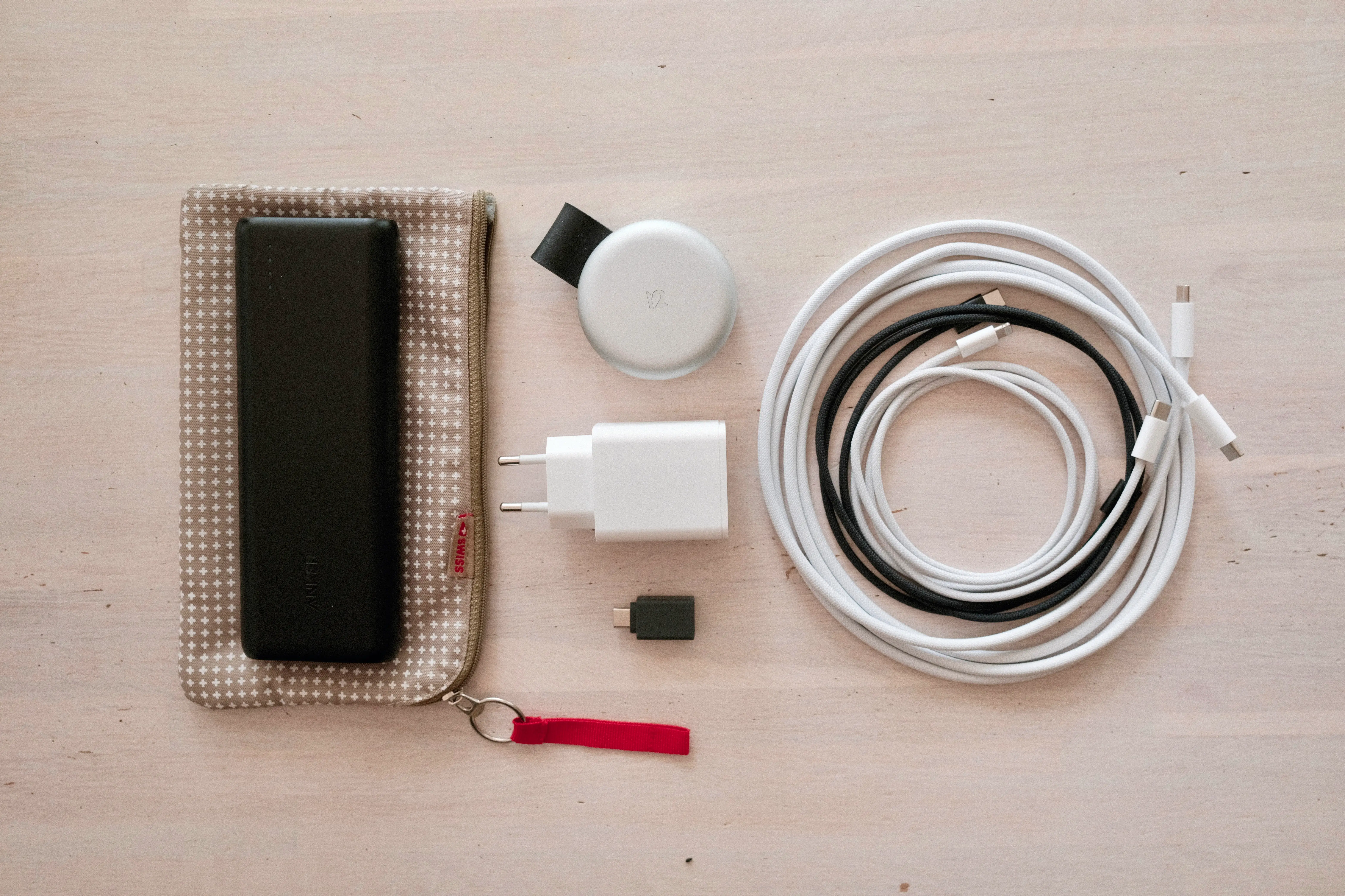 My small pouch with its chargers, 3 cables and power bank