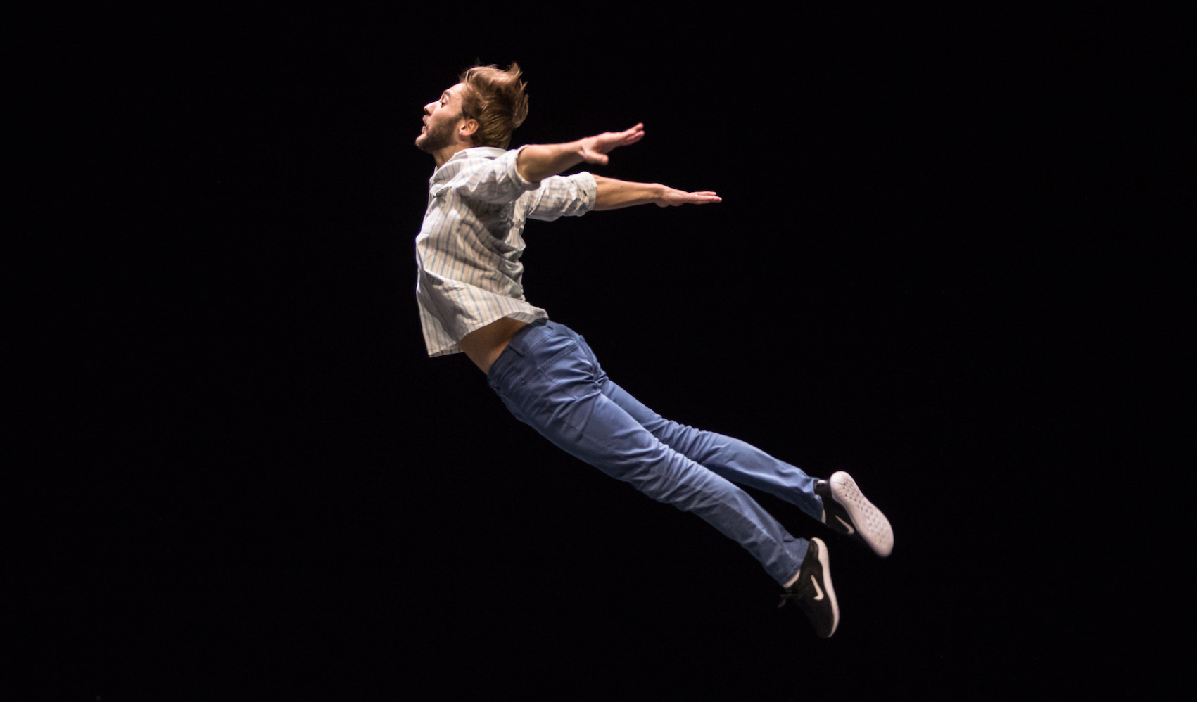Dancer in full jump. Photo by Gregory Batardon.